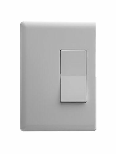 Modern white light switch on wall